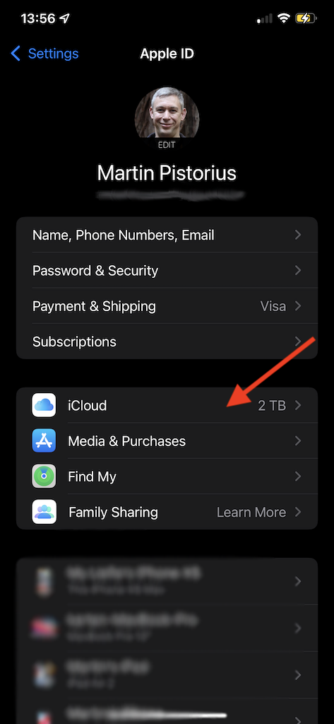 Screen shot showing Apple ID settings with an arrow pointing to iCloud 