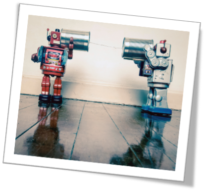 Two robots, each holding an empty beans can connected by some string