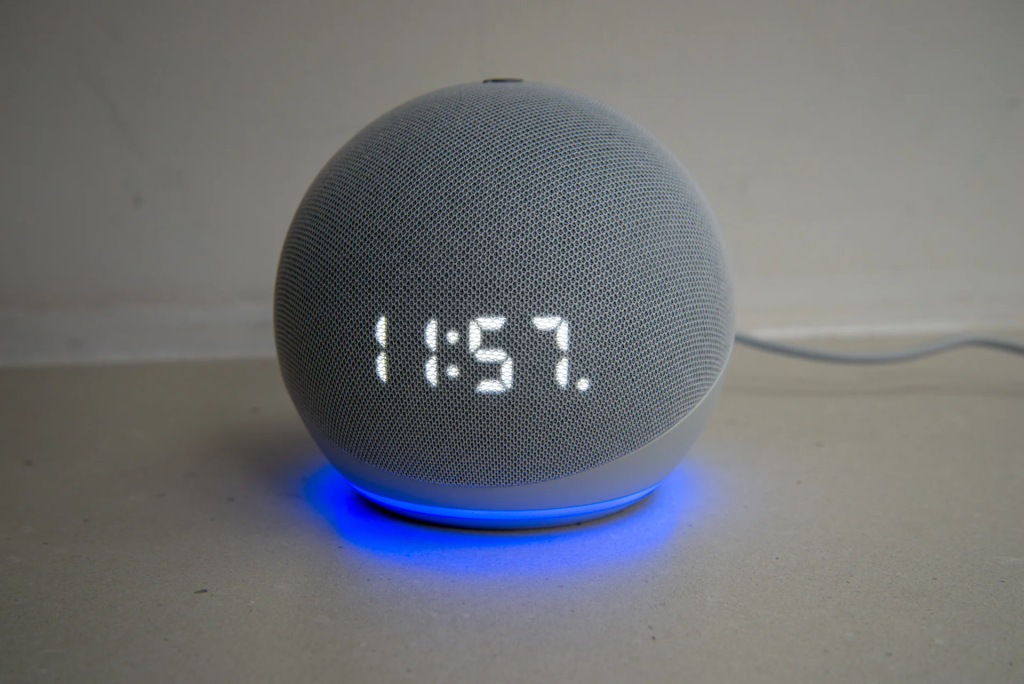 An Amazon echo device on a desk 