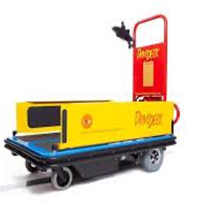 A Smile Smart Tech innovative Drive-Deck resembles a trolly, with yellow sides and a red barrier at one end. It has for wheels underneath. It allows a person in a wheelchair to be pushed onto the drive deck and the control it using a joystick.
