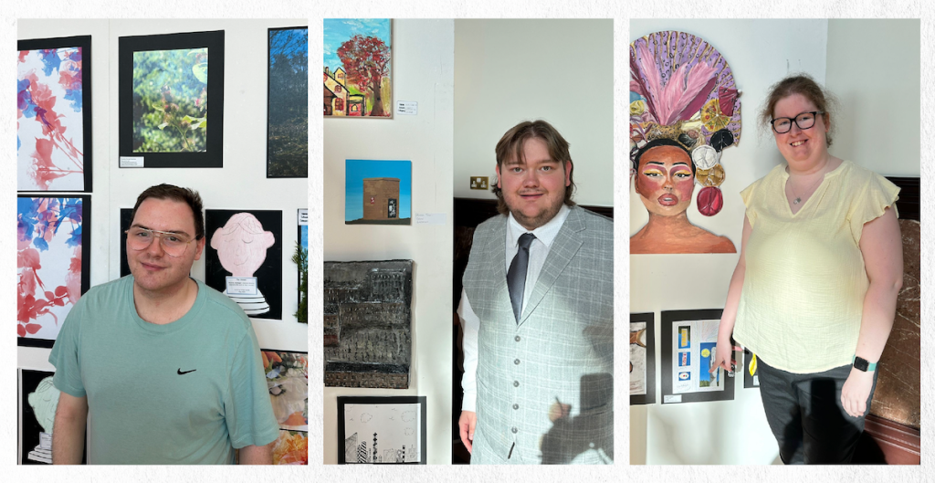 Three artists standing beside their exhibited artworks at the Youth Open Art Competition, each smiling proudly in front of their colourful and varied creations.